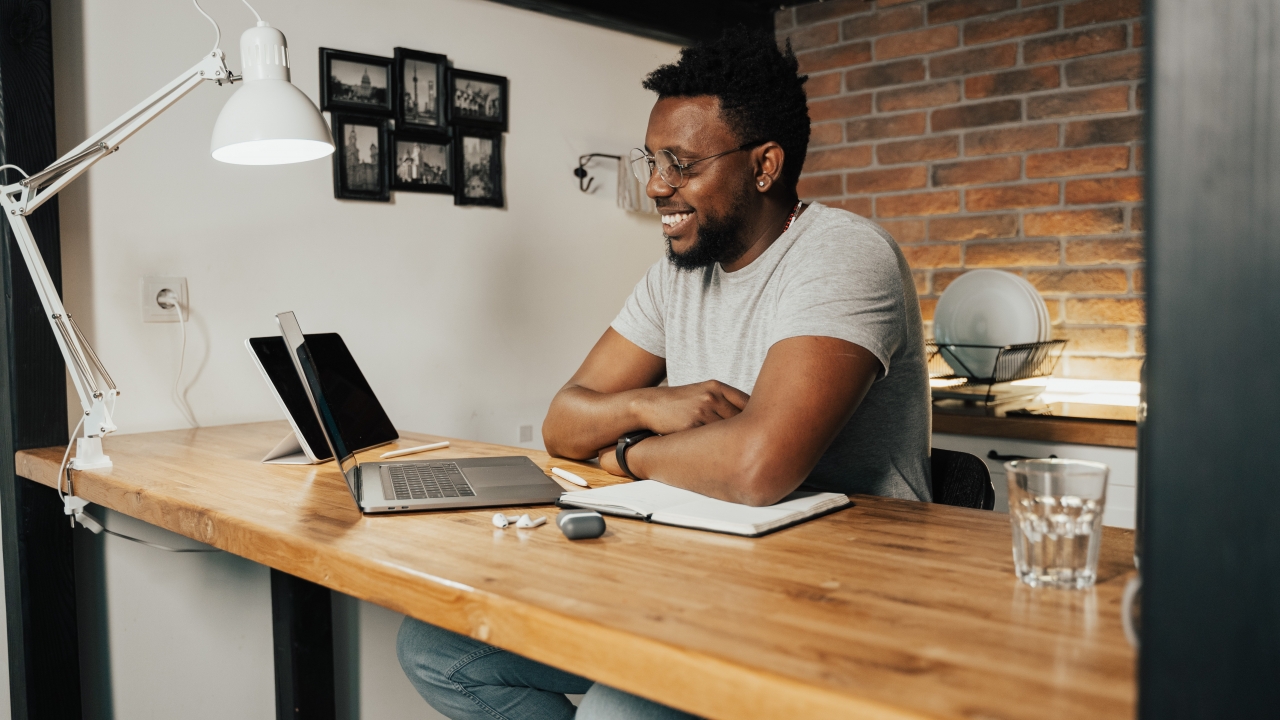 Image of man working at his laptop