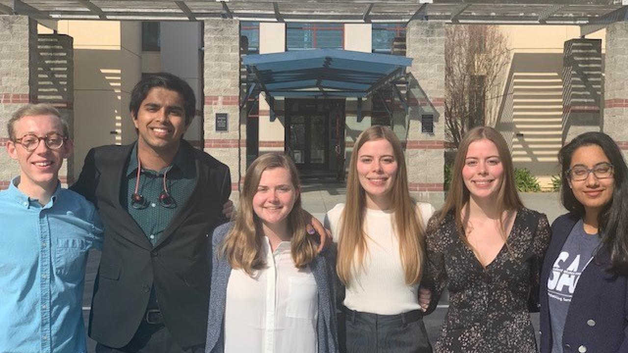 Picture of six students standing in front of the