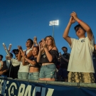 Students cheering of the Aggie football team at the UC Davis Health Stadium