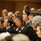 Chorus members singing