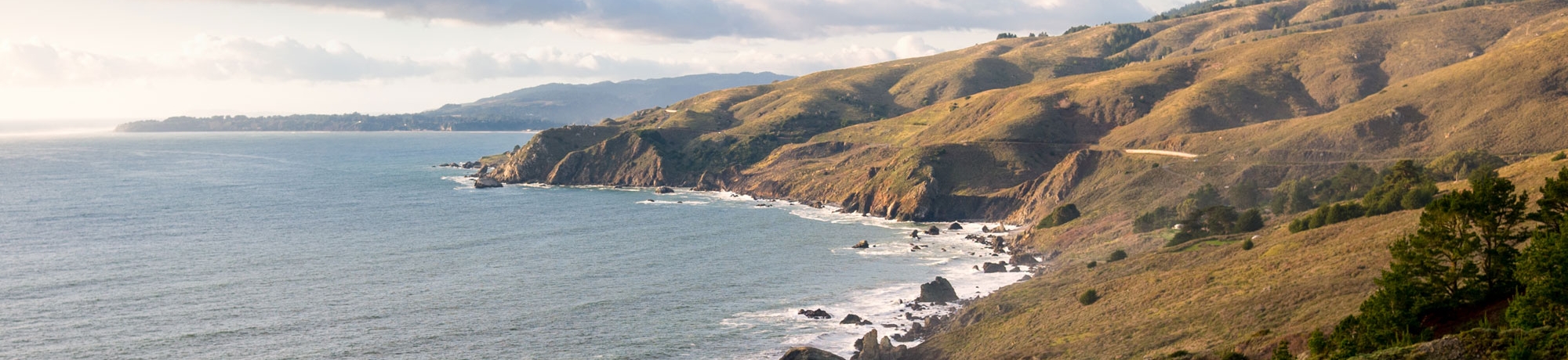 The coastline of North Bay with the ocean and hills visible.